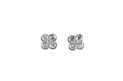 Lot 91 - A pair of diamond cluster earrings Each...