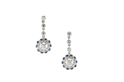 Lot 84 - A pair of sapphire and diamond earrings Each...