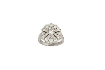 Lot 137 - A diamond dress ring Designed as a slightly...