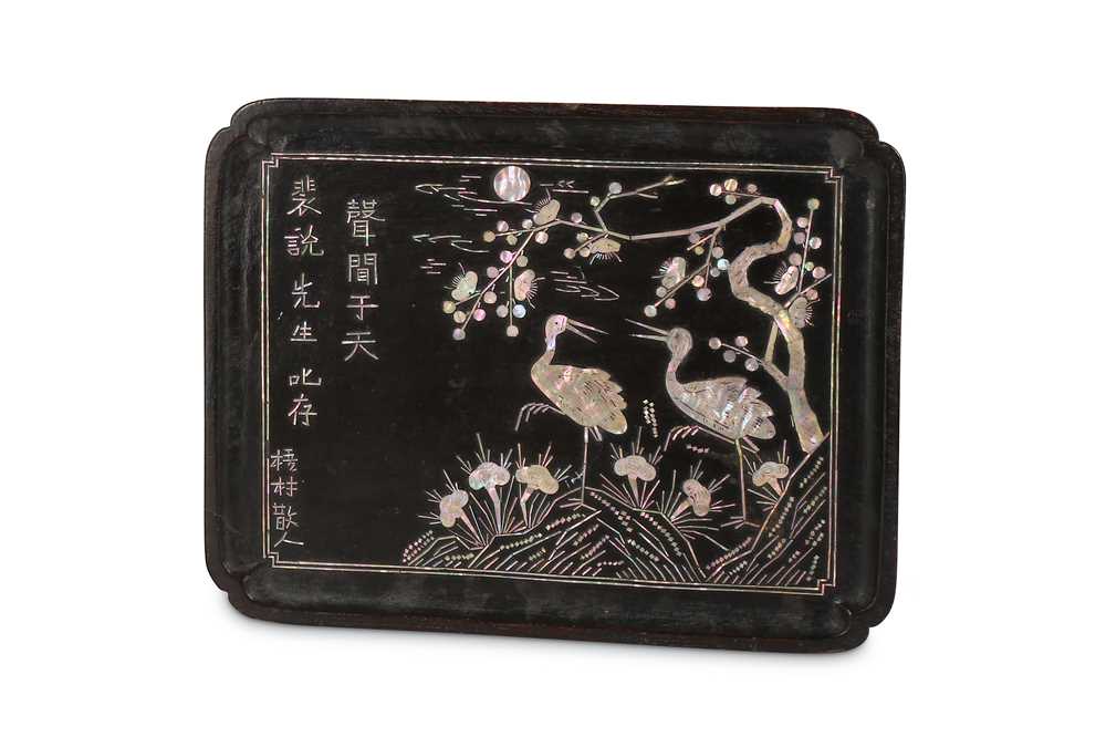 Lot 32 - A KOREAN LACQUER WOOD MOTHER OF PEARL-INLAID...