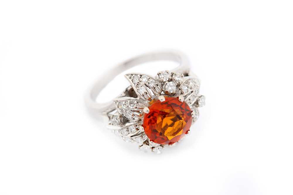 Lot 20 - A citrine and diamond dress ring, the circular-...