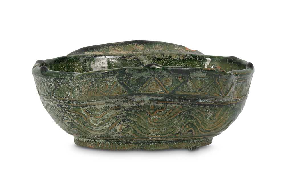 Lot 326 - A CHINESE GREEN-GLAZED BOWL. Han Dynasty. The...