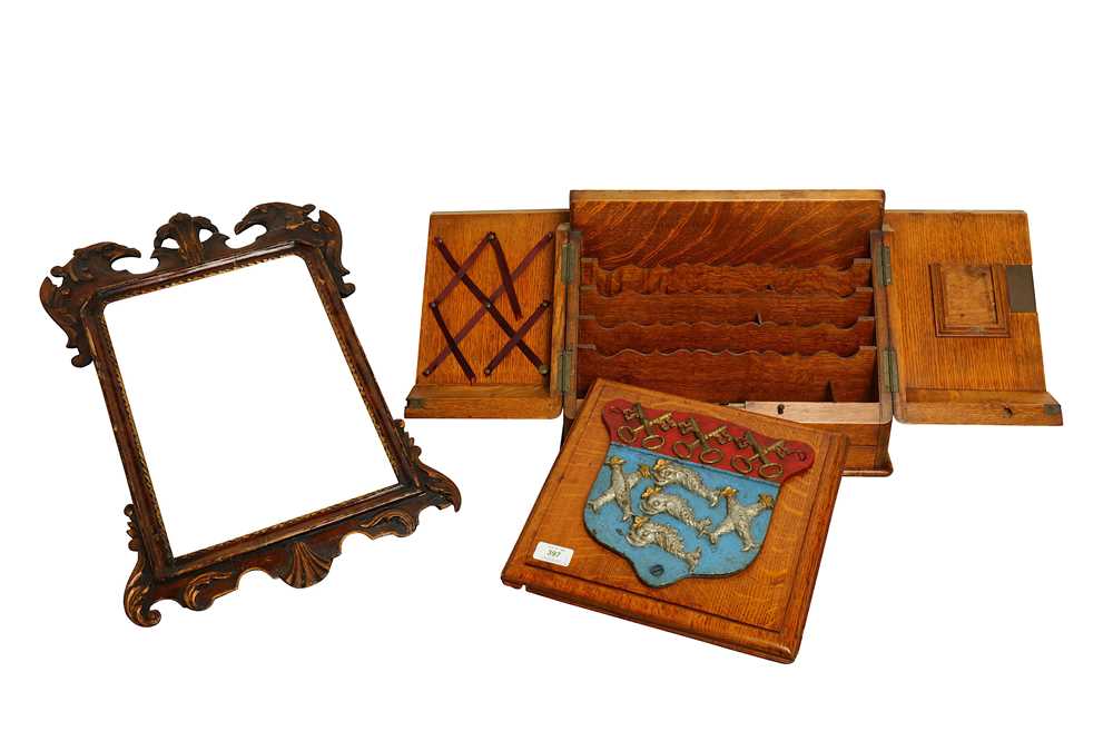 Lot 397 - A Victorian iron sheild, cast with the arms of...