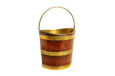 Lot 407 - A Georgian mahogany brass bound bucket, of...