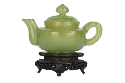 Lot 514 - A CHINESE SERPENTINE TEAPOT AND COVER. The...