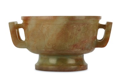 Lot 149 - A CHINESE PALE CELADON ARCHAISTIC CUP. The...
