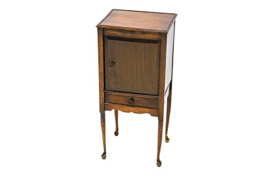 Lot 447 - A mahogany night stand with a candle slide...