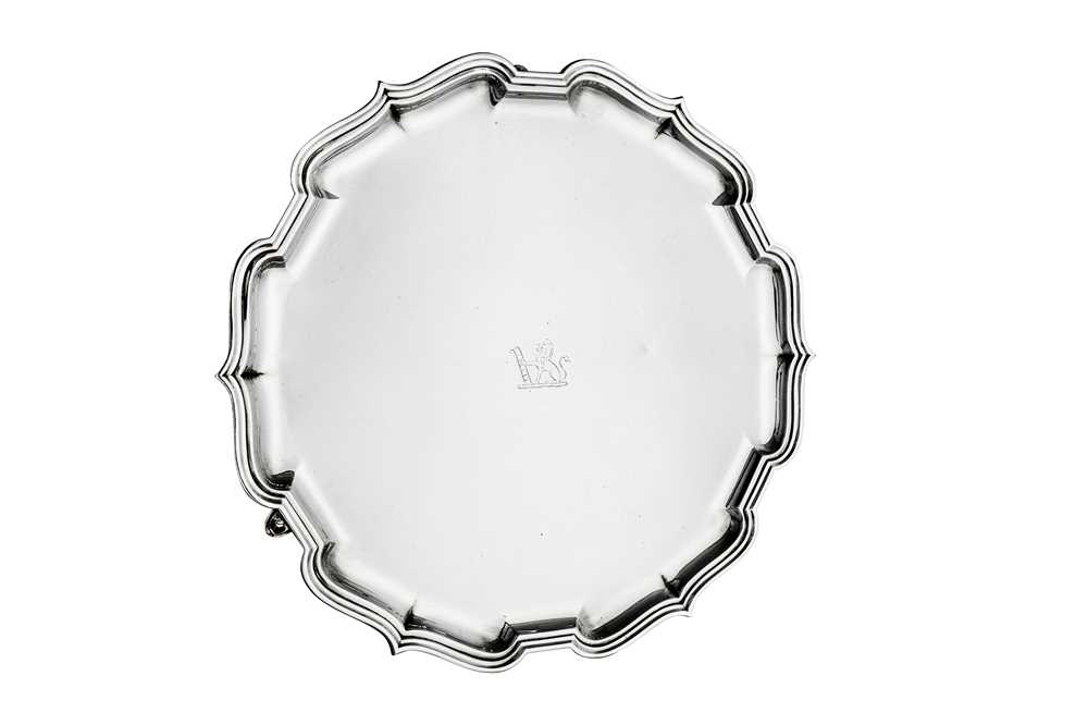 Lot 484 - A large George V sterling silver ‘bath border’ salver, Sheffield 1928 by Mappin & Webb