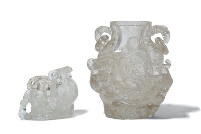 Lot 113 - TWO CHINESE ROCK CRYSTAL VASES AND COVERS....