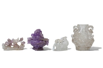 Lot 228 - A COLLECTION OF AMETHYST AND ROCK CRYSTAL CARVINGS.