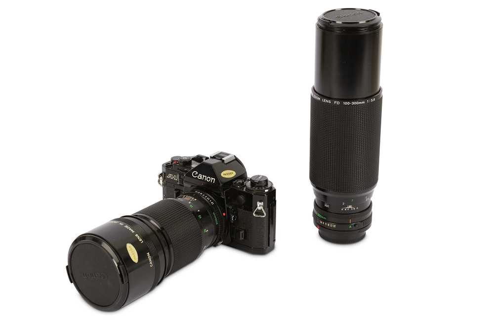 Lot 224 - Canon A-1 SLR Outfit
