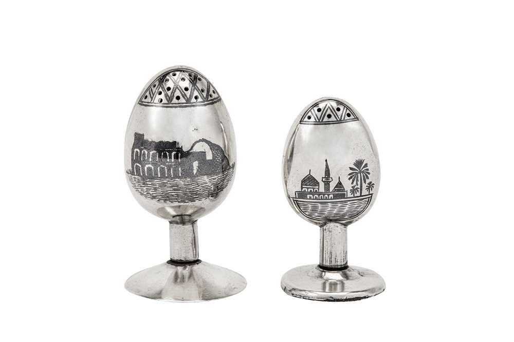 Lot 411 - A graduated pair of mid-20th century Iraqi unmarked silver and niello condiments, Basra or Omara circa 1960