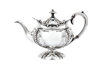 Lot 464 - An Edwardian sterling silver three-piece bachelor tea set, Sheffield 1903 by Fenton, Russell & Co Ltd