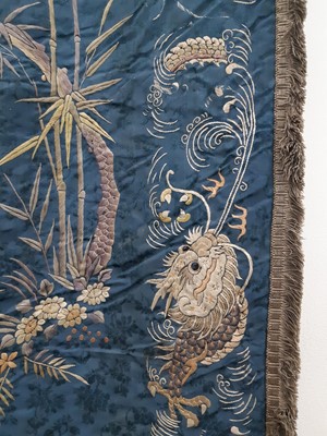 Lot 381 - A LARGE CHINESE BLUE-GROUND ‘FANTASTIC LANDSCAPE’ SILK EMBROIDERY PANEL.