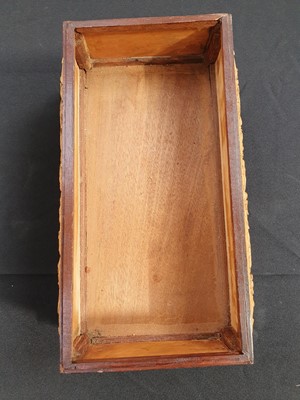 Lot 690 - A CHINESE BOXWOOD INSET HARDWOOD 'DRAGON AND PHOENIX' BOX AND COVER.