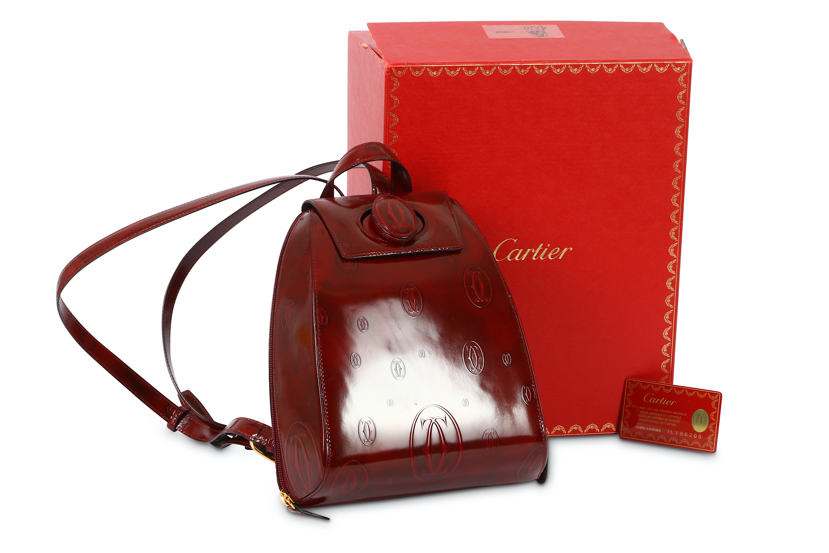 Lot 206 - Cartier Embossed Bordeaux Patent Happy