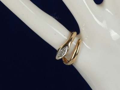 Lot 309 - A 14K gold serpent ring, set with diamond to...
