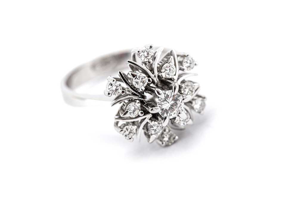 Lot 5 - A diamond dress ring, set with a raised...