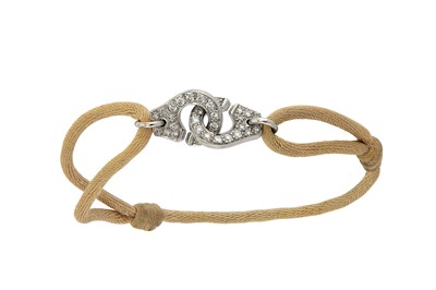 Lot 114 - A diamond-set 'Menottes' bracelet, by Dinh Van...