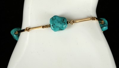 Lot 310 - An 18ct gold and turquoise set bar link bracelet.