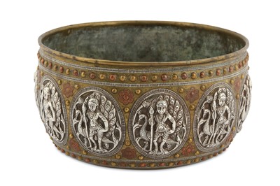Lot 301 - -WITHDRAWN - A THANJAVUR SILVER AND COPPER-INLAID BRASS BOWL