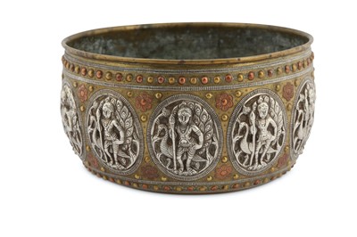 Lot 301 - -WITHDRAWN - A THANJAVUR SILVER AND COPPER-INLAID BRASS BOWL