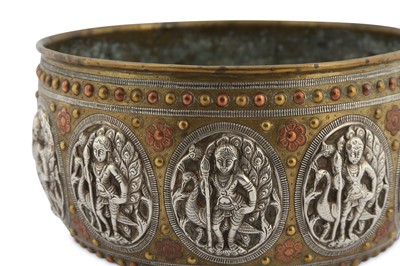 Lot 301 - -WITHDRAWN - A THANJAVUR SILVER AND COPPER-INLAID BRASS BOWL