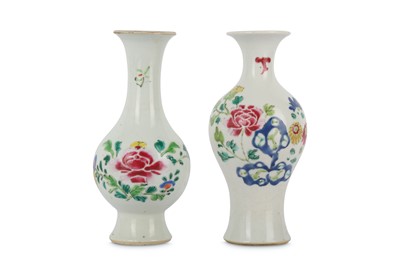 Lot 371 - TWO CHINESE FAMILLE ROSE FLORAL VASES. Qing...