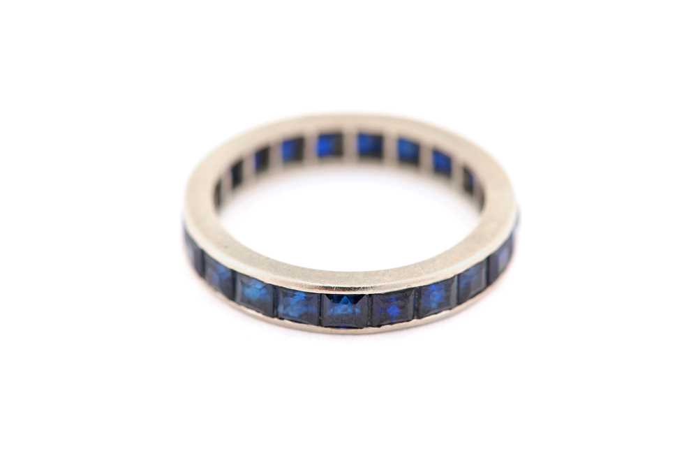 Lot 3 - A sapphire eternity ring, designed as a...