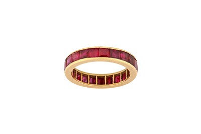 Lot 34 - A ruby eternity ring Set with a continuous row...