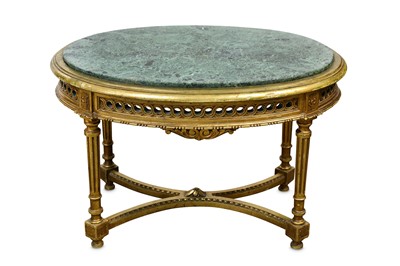 Lot 316 - An oval carved giltwood coffee table with an...