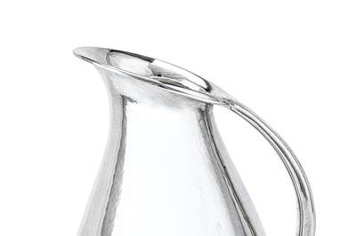 Lot 282 - A late-20th century Danish sterling silver water pitcher / jug, Copenhagen designed by Johan Rohde (1856-1935) for Georg Jensen, import marks for London 1994