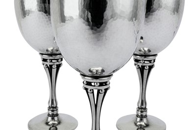 Lot 281 - A set of three late 20th century Danish sterling silver water goblets, Copenhagen designed by Harald Nielsen (1892-1977) for Georg Jensen, import marks for London 1992