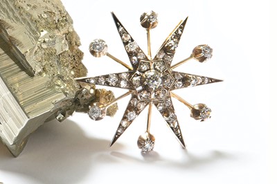 Lot 1 - A diamond star brooch, circa 1890 The six ray...