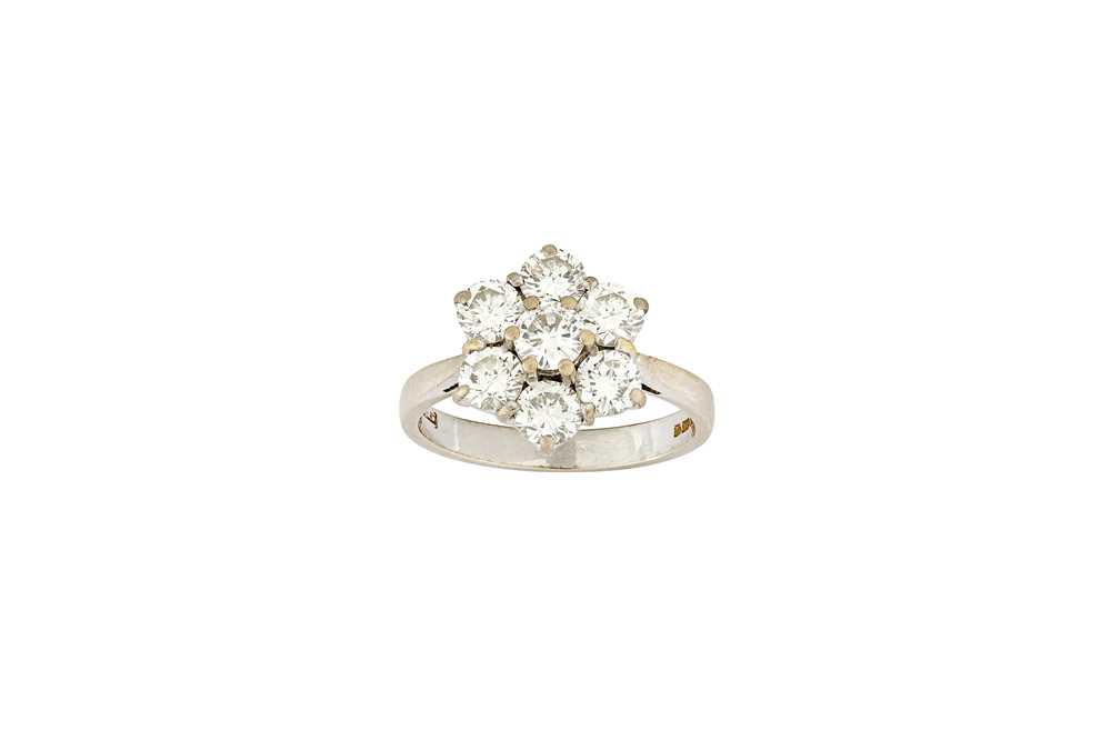 Lot 176 - A diamond cluster ring Designed as a tiered...