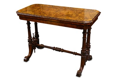 Lot 304 - A Victorian figured walnut card table, the...
