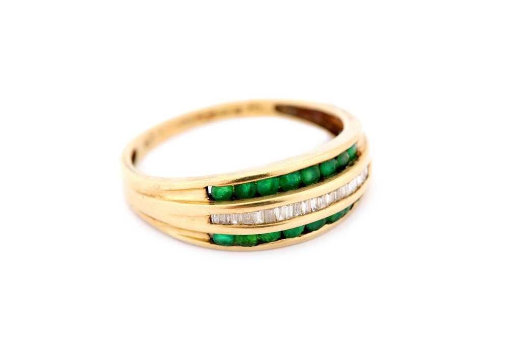 Lot 24 - Two emerald-set rings, the first set with...