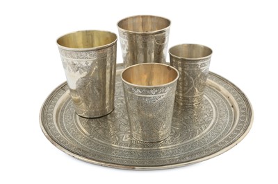 Lot 166 - A SILVER CIRCULAR TRAY AND FOUR BEAKERS