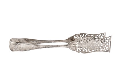 Lot 357 - An Edwardian sterling silver pair of asparagus tongs, Sheffield 1909 by Martin, Hall & Co