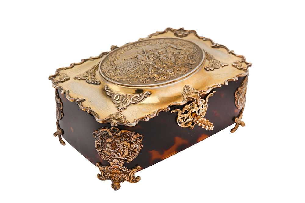 Lot 211 - A Victorian sterling silver-gilt mounted tortoiseshell dressing table casket, London 1899 by George Fox