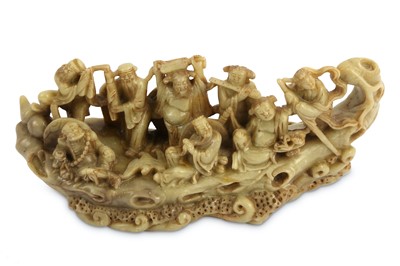Lot 222 - A Chinese soapstone carving of a eight...