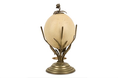 Lot 37 - AN EARLY 20TH CENTURY SILVERED BRASS MOUNTED OSTRICH EGG