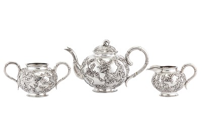 Lot 171 - An early 20th century Chinese export silver three-piece tea service, Shanghai circa 1910 retailed by Luen Hing