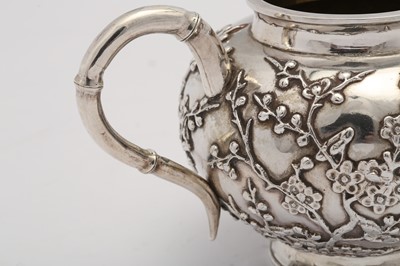 Lot 249 - An early 20th century Chinese export silver three-piece tea service, Shanghai circa 1910 retailed by Luen Hing