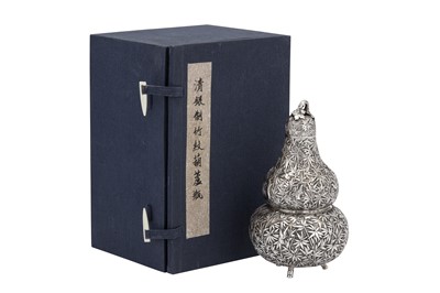 Lot 247 - A mid to late 19th century Chinese export silver double gourd tea caddy or wine bottle, Canton circa 1870 retailed by Cum Shing