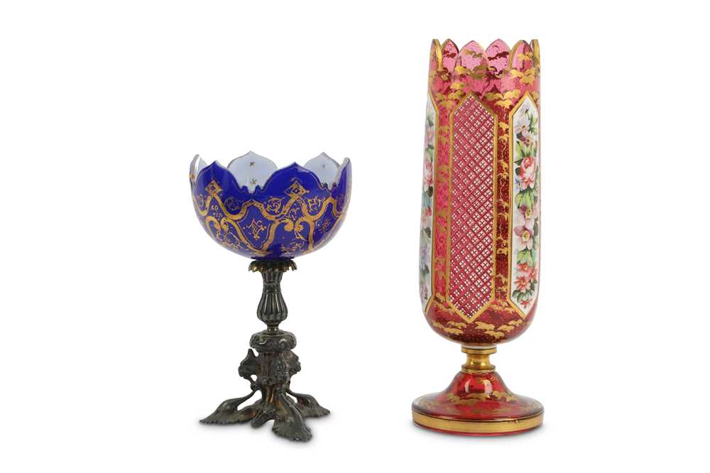 Lot 194 - A Bohemian ruby glass vase with panels of...