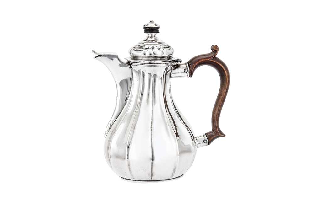 Lot 242 - A late 18th century German silver bachelor coffee pot (verseuse égoiste), probably Uberlingen circa 1780 by MFL with a device (untraced)