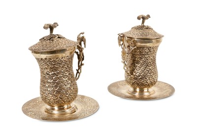 Lot 140 - A PAIR OF EGYPTIAN SILVER SAHLEP CUPS...