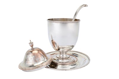 Lot 397 - An early 20th century silver plated wrought copper covered punch bowl on stand, with ladle, circa 1930 by the Duchess of Sutherland Cripples Guild