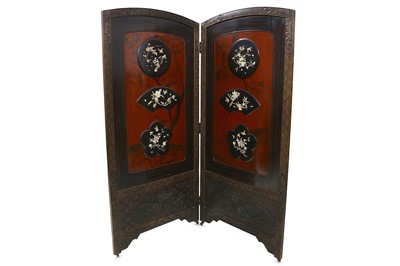 Lot 309 - A large Japanese two fold lacquered screen...